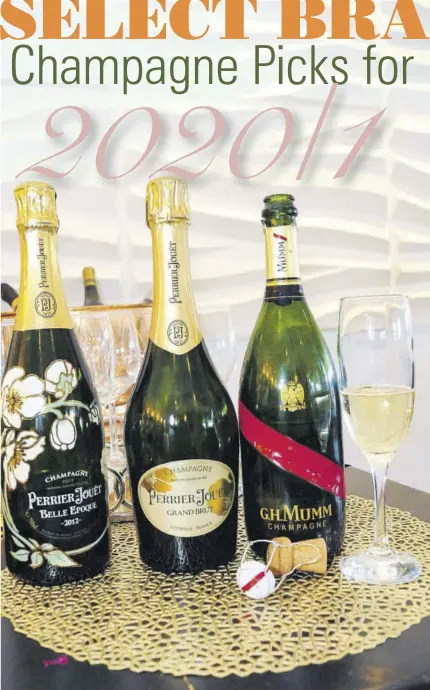  ?? (Photos: Garfield Robinson) ?? Champagnes (from left) 2012 Perrier-jouët Belle Epoque, Perrier-jouët Grand Brut and GH Mumm Brut Grand Cordon