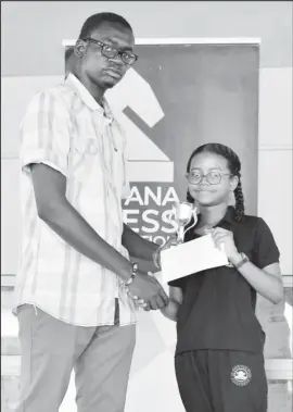  ?? ?? Kataleya Sam (right) receives her prizes after winning the National Girl’s U12 Chess Championsh­ip