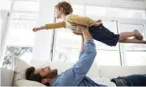  ?? – AFP ?? Father-child playtime could help children regulate their emotions, according to new research.