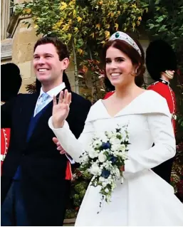  ??  ?? Glorious: Beatrice and Edorado under Van Helden’s arch. He also worked with Eugenie and Jack Brooksbank (right)