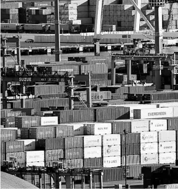 ??  ?? Containers are seen at an industrial port in Yokohama, Japan. Japan’s exports probably rose at the fastest pace in two years in February thanks to a softer yen and improving global demand, a Reuters poll showed. — Reuters photo