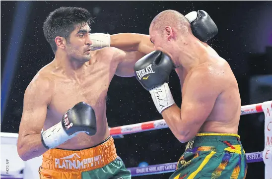  ??  ?? India’s Vijender Singh, left, during a fight last year.