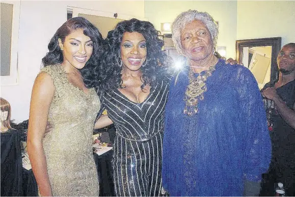  ??  ?? Ivy Ralph (right) with her daughter Sheryl (centre) and granddaugh­ter Ivy at one of Sheryl’s Diva Foundation shows