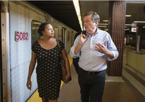  ?? EDUARDO LIMA/METRONEWS FILE PHOTO ?? Mayor John Tory with Bianca Spence after their ride on Line 2 last September. Tory turned up the heat on the TTC to solve its “hot car” problem.