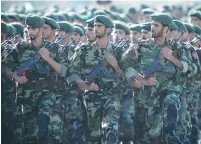  ?? (Morteza Nikoubazi/Reuters) ?? MEMBERS OF the IRGC march in Tehran in 2007 during a military parade.