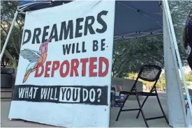  ?? BRIEANNA J. FRANK/THE REPUBLIC ?? With state attorneys general threatenin­g legal action, immigrant advocates in Arizona and elsewhere are pressuring President Donald Trump to keep the DACA program in place.