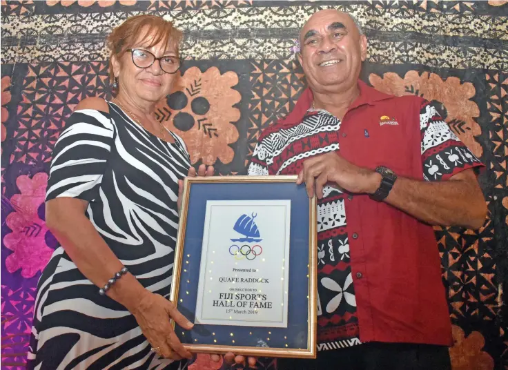  ?? Photo: Nicolette Chambers ?? From left Susan Raddock receives the award from FASANOC president Joe Rodan Snr at the Fiji Sports Hall of Fame and Fiji Olympic Order at the South Sea Orchids, Nadi on March 15, 2019.