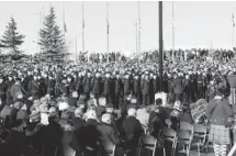  ?? Lorraine Hjalte/Calgary Herald ?? It’s estimated about 15,000 people turned out Monday at the Military Museums’s outdoor Remembranc­e Day service.