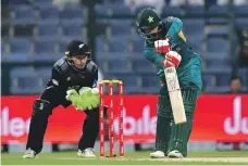  ??  ?? Pakistan batsman Mohammed Hafeez’s half century played a vital role in Sunday’s win over New Zealand in Dubai AFP