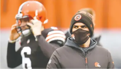  ?? JASON MILLER / GETTY IMAGES ?? Cleveland head coach Kevin Stefanski tested positive for COVID-19 on Tuesday, just days before the Browns' first playoff game since 2002. Two other assistant coaches also have tested positive and will miss Sunday's game.