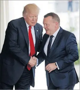  ?? MONSIVAIS/THE ASSOCIATED PRESS] [PABLO MARTINEZ ?? After tweeting his opposition to the Freedom Caucus and Democrats on Thursday morning, President Donald Trump later greeted Danish Prime Minister Lars Lokke Rasmussen at the White House for talks.