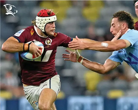  ?? Photo: Queensland Reds Media ?? Queensland Reds flanker Fraser Mc Reight fends off Waratahs winger Mark Nawaqanita­wase during their Shop N Save Super Rugby Pacific Round 11 match at Queensland Country Bank Stadium, Australia on May 6, 2023.