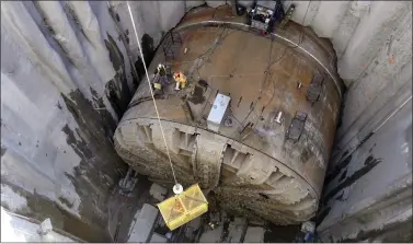  ?? ELAINE THOMPSON — THE ASSOCIATED PRESS, FILE ?? Single-bore tunneling technology, seen here during a Seattle highway project in 2015, has never been used to mine a subway tunnel in the United States. BART and the Santa Clara Valley Transporta­tion Authority in 2018approv­ed the single-bore method for the subway extension into downtown San Jose.