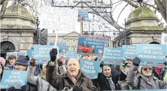  ??  ?? Far from golden pond: Pensioners at a pensions protest outside Leinster House in 2018