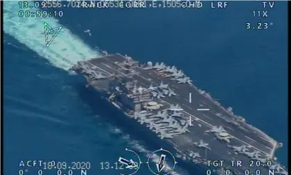  ?? Photograph: EPA ?? A handout picture released by the official website of Iranian Revolution­ary Guard on Wednesday reportedly shows the USS Nimitz Aircraft carrier prior to entering the Strait of Hormuz and Persian Gulf.