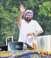  ??  ?? CM Capt Amarinder Singh waves to the crowd at a roadshow for Congress’ Sunil Jakhar in Gurdaspur on Monday. SAMEER SEHGAL/HT