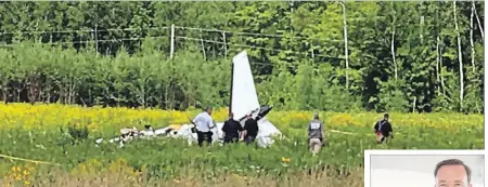  ?? THE ASSOCIATED PRESS ?? This photo provided by WVII-TV/ABC7 shows the tail of Joe Robertson’s small plane that crashed in Greenville, Maine, Monday, killing the Niagara-on-the-Lake man, wife Anita and 24-year-old daughter Laura.