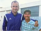  ??  ?? American adventurer John Allen Chau, right, poses for a photograph with Ubuntu Football Academy founder Casey Prince in Cape Town, South Africa, days before Chau left for North Sentinel Island, where he was killed. SARAH PRINCE / AP