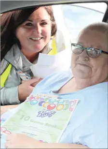  ??  ?? Ann Faulkner and Deirdre Delaney at the drive in bingo in Clogherhea­d.