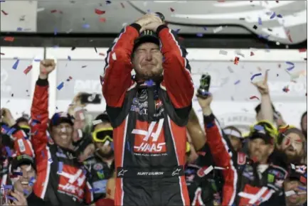  ?? CHUCK BURTON — THE ASSOCIATED PRESS ?? Kurt Busch celebrates in Victory Lane after winning the NASCAR Daytona 500 auto race at Daytona Internatio­nal Speedway in Daytona Beach, Fla., Sunday.