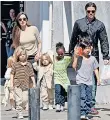  ??  ?? Travelling circus: the Jolie-Pitts with five of their children in 2011