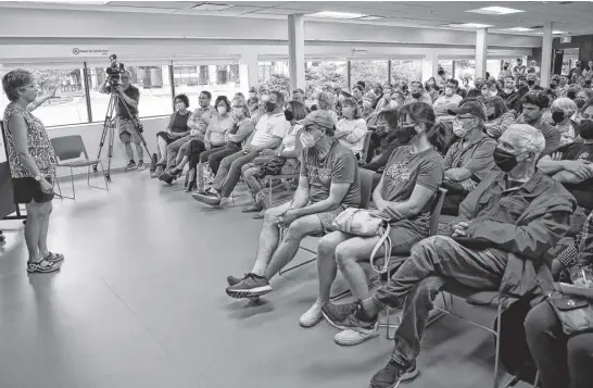  ?? TIM KROCHAK ■ THE CHRONICLE HERALD ?? Jill Brogan, with Friends of Dartmouth Cove, speaks at the start of a well-attended meeting with those concerned about a proposed infilling applicatio­n, at the Zatzman Sportsplex in Dartmouth on Monday.