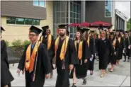  ?? ERIN JELLESMA — MONTGOMERY COUNTY COMMUNITY COLLEGE ?? Students in the Class of 2018 ranged in age from 17 to 77, and included 112 Police Academy graduates, 39 Culinary Arts Institute graduates, 35 military veterans and 34 internatio­nal graduates.