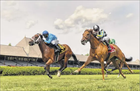  ?? Skip Dickstein / Special to the Times Union ?? Starship Jubilee, left, with Javier Castellano, holds off Call Me Love and Joel Rosario to win the Ballston Spa Saturday. Sisterchar­lie finished third.