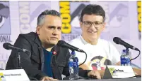  ?? PHOTO BY RICHARD SHOTWELL/INVISION/AP ?? Joe Russo, left, and Anthony Russo participat­e in a conversati­on with the Russo Brothers at Comic-Con on Friday in San Diego.
