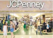  ?? MATT SLOCUM/ ASSOCIATED PRESS ?? Customers walk out of a J.C. Penny department store in Dallas. The company is closing 130 to 140 stores in the next several months as it aims to improve profitabil­ity in the era of online shopping.