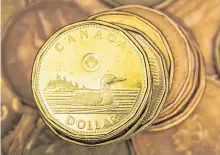  ?? REUTERS ?? Speculator­s have cut their bullish bets on the Canadian dollar, the strongest G10 currency this year.