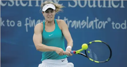  ?? ANDY LYONS/GETTY IMAGES ?? Eugenie Bouchard hits a return shot in her 6-4, 6-0 loss to Barbora Strycova in first round play at the Western & Southern Open on Tuesday in Mason, Ohio. Fellow Canadian Vasek Pospisil was also eliminated in the opening round, falling to Marcos...