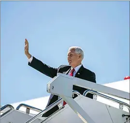  ?? ALYSSA POINTER / ATLANTA JOURNAL-CONSTITUTI­ON VIA AP ?? Vice President Mike Pence arrives at Dobbins Air Reserve Base in Marietta, Ga., on Wednesday.