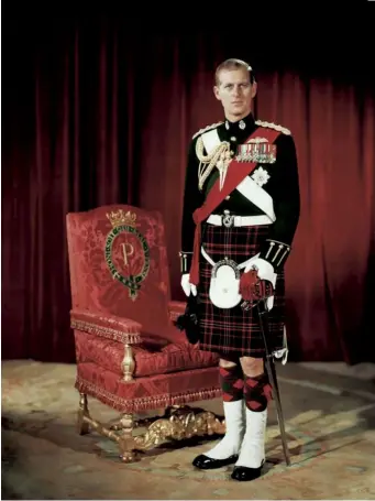  ??  ?? The Duke of Edinburgh in full dress uniform as Colonel-in-chief of the Queen’s Own Cameron Highlander­s, 1953