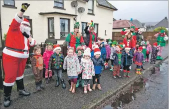  ?? Photograph: Iain Ferguson, alba.photos ?? The nursery children spread Christmas cheer as they made their way through Caol to give a short carol service in the shopping square.
