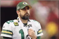  ?? Ben Margot / Associated Press ?? Green Bay Packers quarterbac­k Aaron Rodgers watches from the sideline during the first half of the NFC Championsh­ip game against the San Francisco 49ers in Santa Clara, Calif.