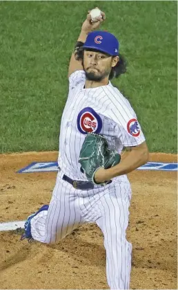  ??  ?? Yu Darvish (left) allowed three runs, two hits and struck out nine in six innings. The Reds’ Trevor Bauer allowed three hits and struck out 10 in 7⅔ innings.