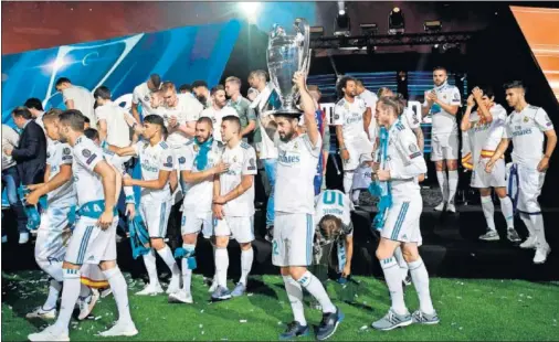  ??  ?? BUENAS CIFRAS. El Madrid campeón de la Champions 2017-18 es el ganador con mejor balance económico en la historia de la competició­n.