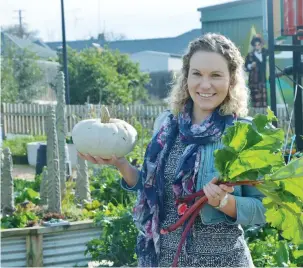  ??  ?? Baw Baw Food Movement member Nikki Robinson shows off some home grown clean food that will be the focus of a workshop this month.