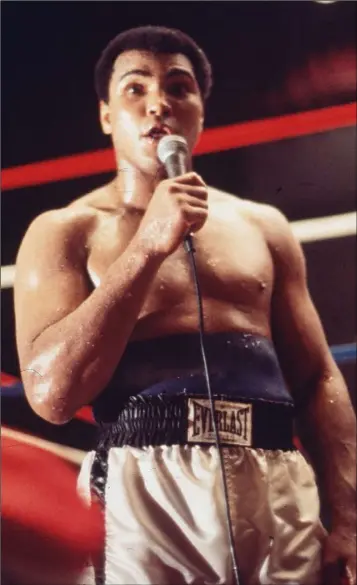  ??  ?? Muhammad Ali addressing the crowd before his fight with Leon Spinks in New Orleans, in which Ali went on to regain the world heavyweigh­t title.