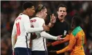  ?? Photograph: Dylan Martinez/Reuters ?? England’s Jack Grealish (second left) says he asked the referee not to send Serge Aurier (not pictured) off before half-time at Wembley.