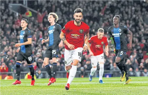  ??  ?? Manchester United’s Bruno Fernandes celebrates after scoring against Club Brugge.