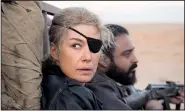  ??  ?? Rosamund Pike portrays war correspond­ent Marie Colvin in A Private War.