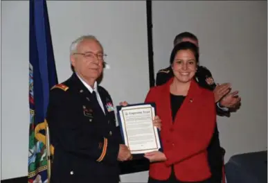  ?? PHOTO PROVIDED ?? U.S. Rep. Elise Stefanik, R-Willsboro, right, presents a Congressio­nal proclamati­on to Lt. Col. (ret.) Nicholas Laiacona, left, for his honor as 2018 Veteran of the Year.