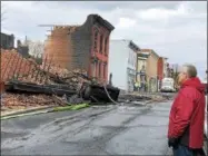  ?? RECORD FILE PHOTO ?? In this file photo, Cohoes Mayor Shawn Morse looks over some of the damage caused by a blaze that affected over 20 buildings in downtown Cohoes in late November. Morse said Thursday that Catholic Charities of Albany has volunteere­d to help distribute...