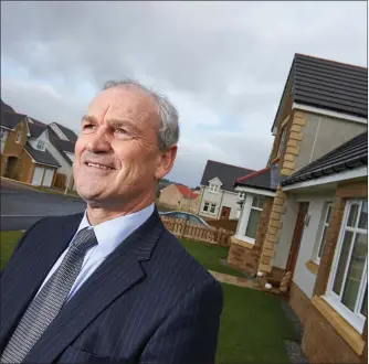  ??  ?? „ George Fraser, chief executive of Tulloch Homes pictured at one of its Inverness developmen­ts.