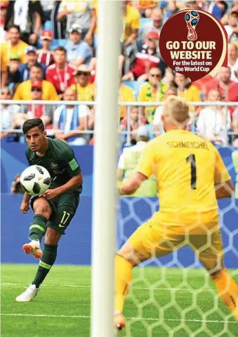  ?? Photo: Dean Lewins/AAP ?? ON TARGET BUT BLOCKED: Australia's Daniel Arzani strikes at goal late in the Socceroos’ World Cup clash with Denmark on Thursday night in Samara, Russia.