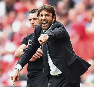  ?? — AFP ?? All pumped up: Chelsea manager Antonio Conte giving instructio­ns to his players from the touchline during the English FA Cup semi-finals against Southampto­n at Wembley on Sunday.