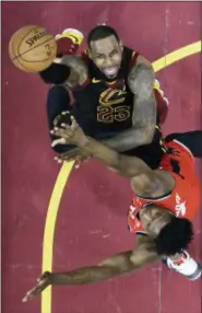  ?? TONY DEJAK — THE ASSOCIATED PRESS ?? Cleveland Cavaliers’ LeBron James shoots against Toronto Raptors’ OG Anunoby in the first half of Game 4of an NBA basketball second-round playoff series, Monday in Cleveland.