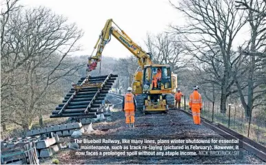  ?? NICK BRODRICK/SR ?? The Bluebell Railway, like many lines, plans winter shutdowns for essential maintenanc­e, such as track re-laying (pictured in February). However, it now faces a prolonged spell without any staple income.